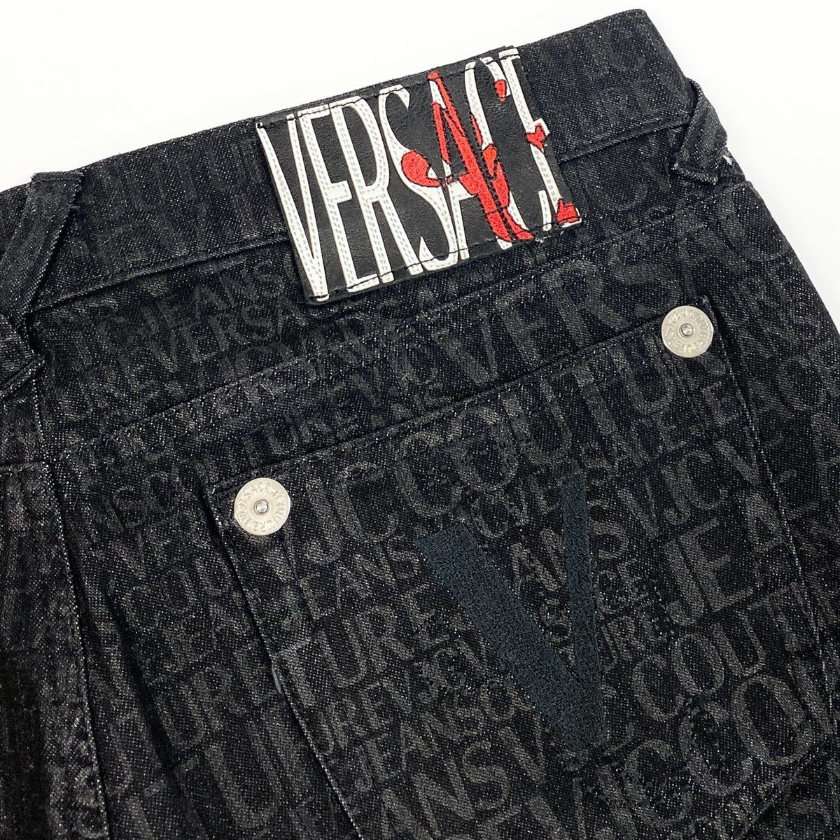 @Id9 VERSACE denim pants with all-over logo print, size 28.u02t