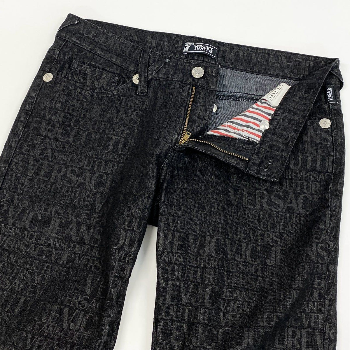@Id9 VERSACE denim pants with all-over logo print, size 28.u02t